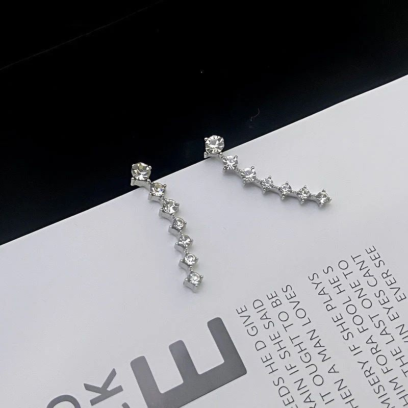 Boucles d'oreilles à sept étoiles