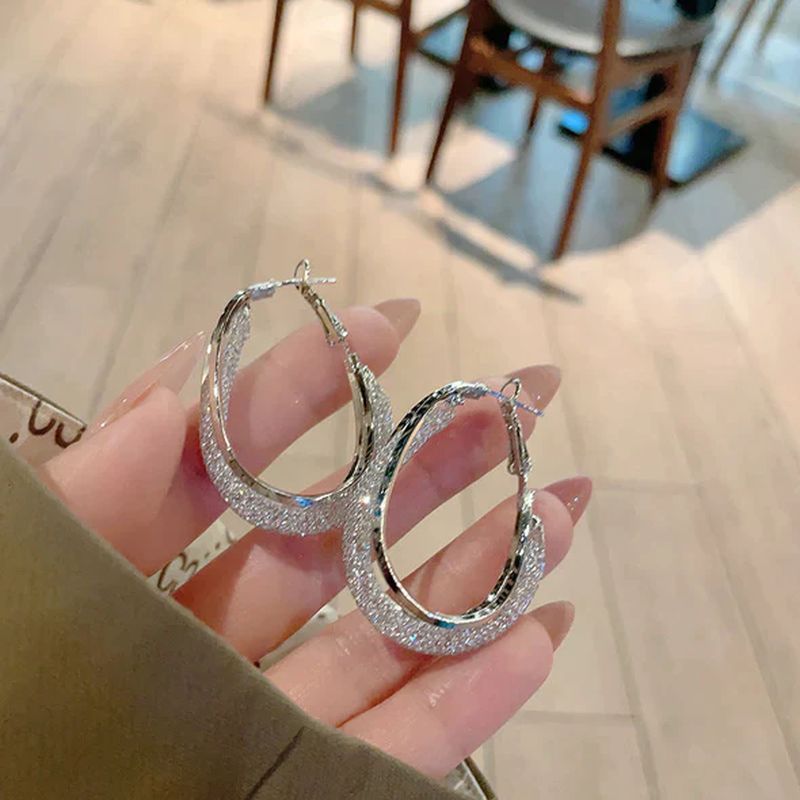 Boucles d’oreilles minimalistes de drainage lymphatique